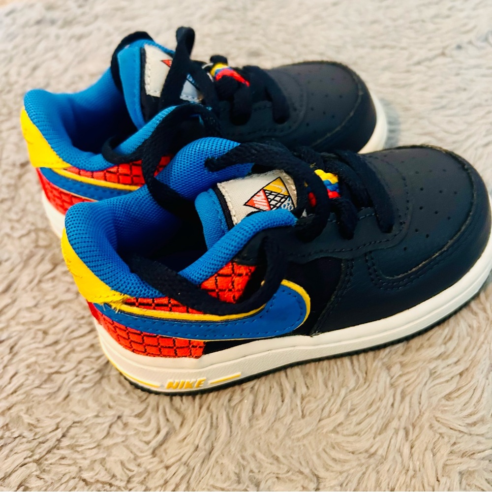 Nike Air Force Ones Toddler Shoe in Navy and colorful accents.
